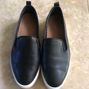 Black platform sneakers